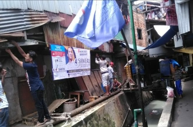 
					Tim Saweri kepung Kampung padat di Johar Baru