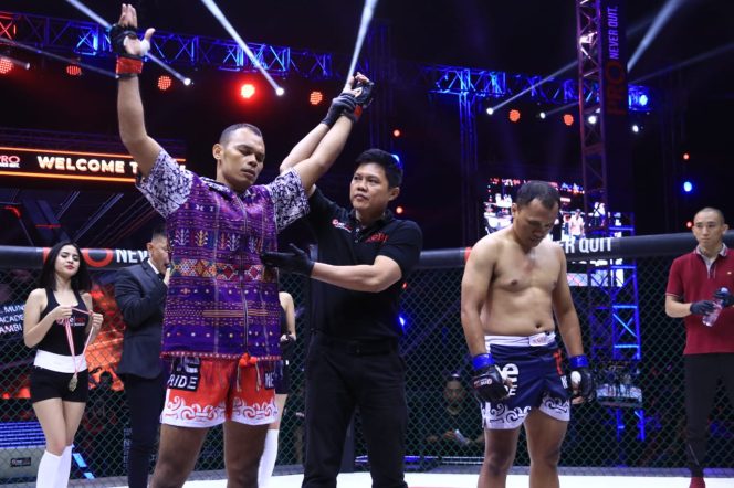 
					Natalex Munster Tantang Sang Juara Theodorus Ginting