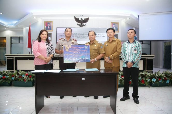 
					Pemkot Dan Polres Kota Bitung Menandatangani NPHD.