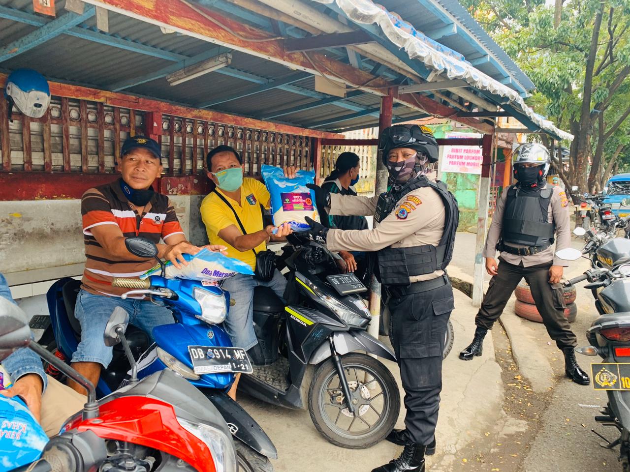 Tim Gagak Hitam Polresta Manado Peduli Covid 19.
