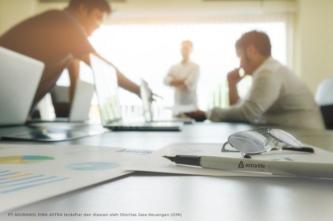
					Business concept with copy space. Office desk table with pen focus and analysis chart, computer, notebook, cup of coffee on desk.Vintage tone Retro filter, selective focus.