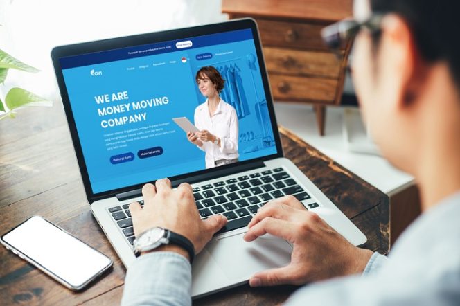 
					mockup image blank screen computer,cell phone with white background for advertising text,hand man using laptop texting mobile contact business search information on desk in office.marketing and design